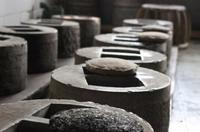“石模”与石磨，谁才是普洱茶工艺中的正统概念？