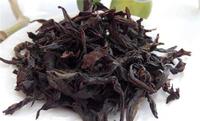 传统炭焙对武夷岩茶所起的作用是什么？